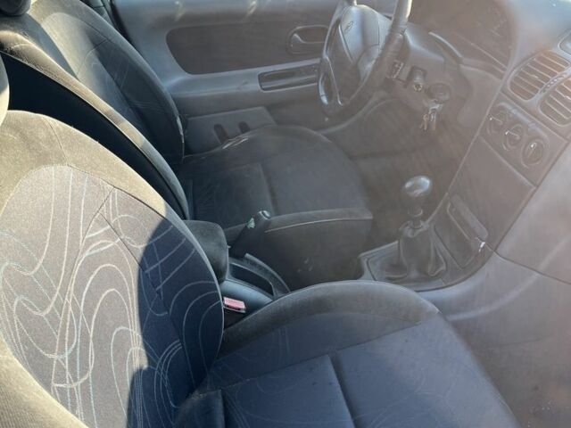 Серый Рено Лагуна, объемом двигателя 1.6 л и пробегом 240 тыс. км за 350 $, фото 5 на Automoto.ua