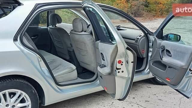 Серый Рено Лагуна, объемом двигателя 1.8 л и пробегом 139 тыс. км за 4700 $, фото 10 на Automoto.ua