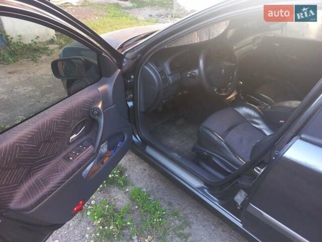 Серый Рено Лагуна, объемом двигателя 1.9 л и пробегом 430 тыс. км за 3700 $, фото 4 на Automoto.ua