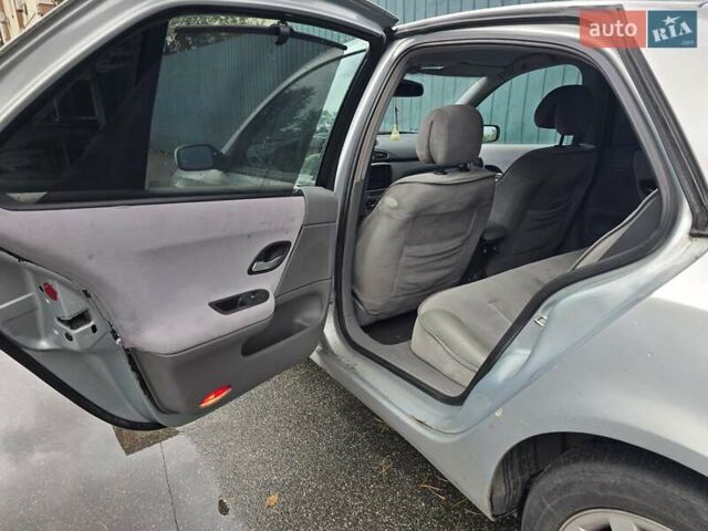 Серый Рено Лагуна, объемом двигателя 1.87 л и пробегом 600 тыс. км за 2900 $, фото 4 на Automoto.ua