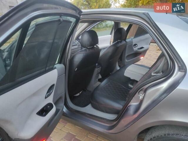 Серый Рено Лагуна, объемом двигателя 1.78 л и пробегом 218 тыс. км за 2999 $, фото 23 на Automoto.ua