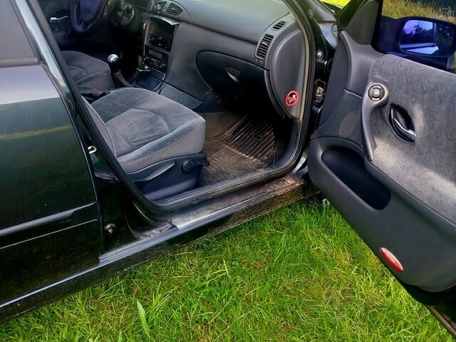 Серый Рено Лагуна, объемом двигателя 1.8 л и пробегом 265 тыс. км за 3500 $, фото 1 на Automoto.ua