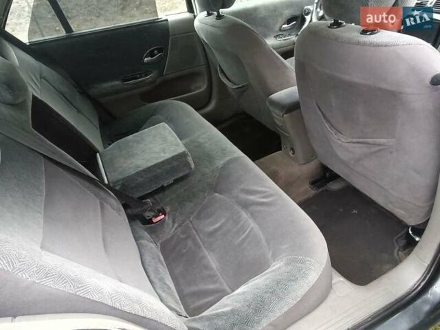 Серый Рено Лагуна, объемом двигателя 1.87 л и пробегом 350 тыс. км за 2750 $, фото 2 на Automoto.ua