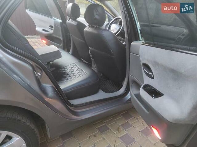 Серый Рено Лагуна, объемом двигателя 1.78 л и пробегом 218 тыс. км за 2999 $, фото 24 на Automoto.ua