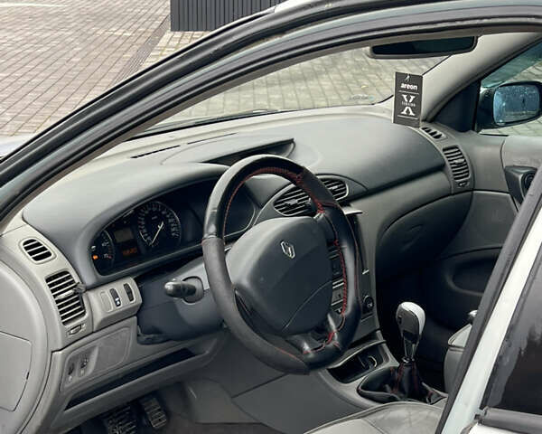 Серый Рено Лагуна, объемом двигателя 2 л и пробегом 300 тыс. км за 2600 $, фото 14 на Automoto.ua