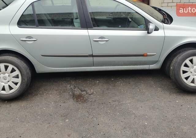 Сірий Рено Лагуна, об'ємом двигуна 1.8 л та пробігом 176 тис. км за 4850 $, фото 9 на Automoto.ua