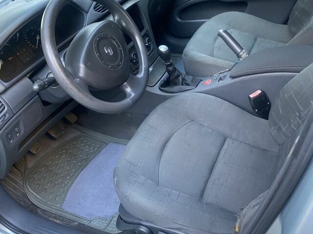 Серый Рено Лагуна, объемом двигателя 1.9 л и пробегом 273 тыс. км за 4300 $, фото 2 на Automoto.ua