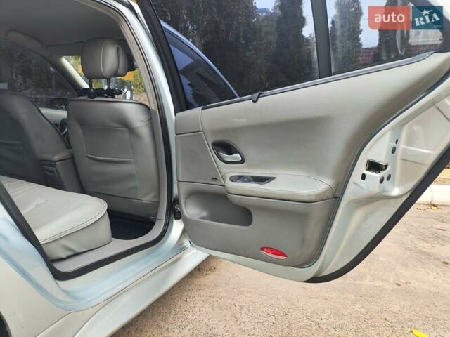 Сірий Рено Лагуна, об'ємом двигуна 2 л та пробігом 237 тис. км за 6000 $, фото 19 на Automoto.ua