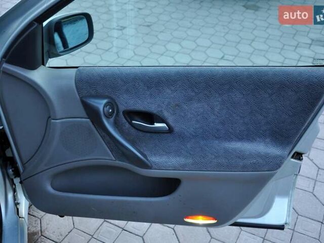 Серый Рено Лагуна, объемом двигателя 1.8 л и пробегом 220 тыс. км за 3300 $, фото 25 на Automoto.ua