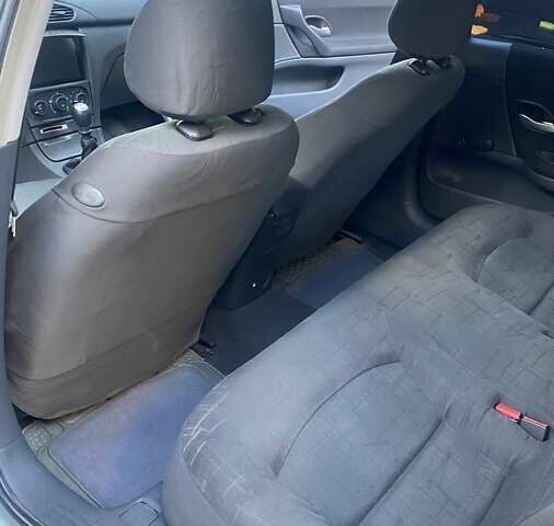 Серый Рено Лагуна, объемом двигателя 1.9 л и пробегом 274 тыс. км за 4300 $, фото 3 на Automoto.ua