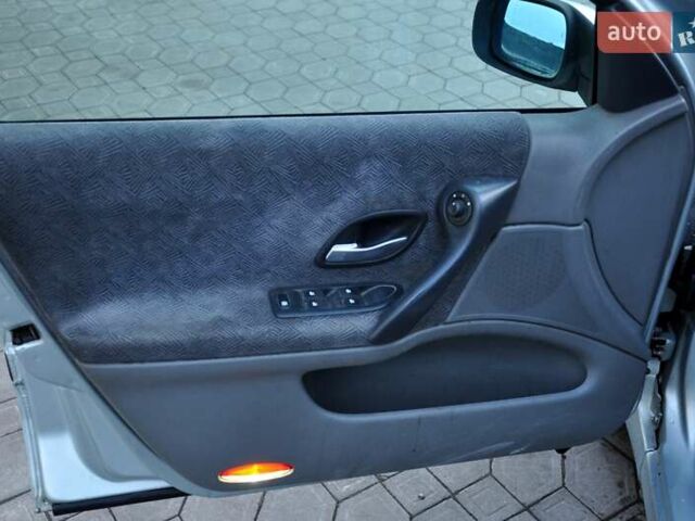 Серый Рено Лагуна, объемом двигателя 1.8 л и пробегом 220 тыс. км за 3300 $, фото 15 на Automoto.ua