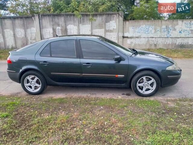 Рено Лагуна 2004 в Белой Церкве на Automoto.ua Серый Рено Лагуна, объемом двигателя 2 л и пробегом 242 тыс. км за 3999 $, фото 10 на Automoto.ua