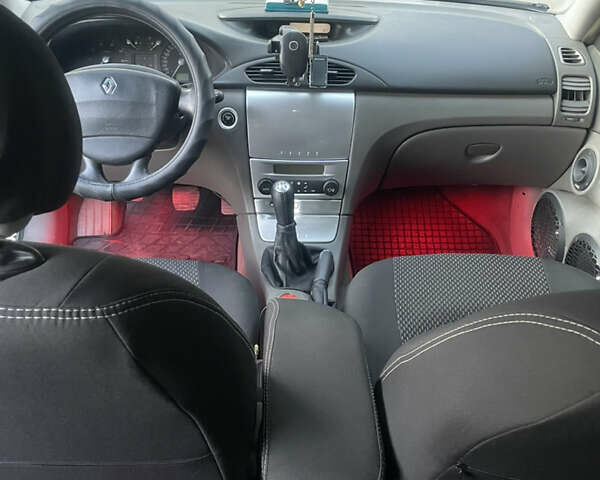 Серый Рено Лагуна, объемом двигателя 2 л и пробегом 306 тыс. км за 4500 $, фото 5 на Automoto.ua