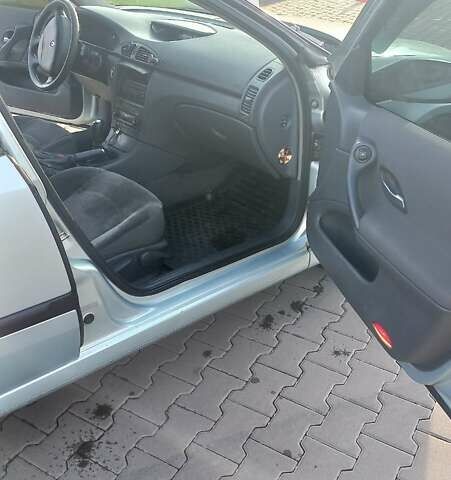 Серый Рено Лагуна, объемом двигателя 1.6 л и пробегом 237 тыс. км за 3300 $, фото 7 на Automoto.ua