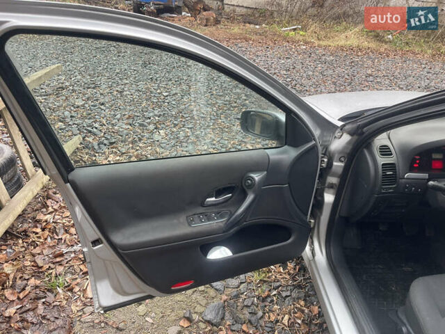 Серый Рено Лагуна, объемом двигателя 2 л и пробегом 396 тыс. км за 4000 $, фото 25 на Automoto.ua