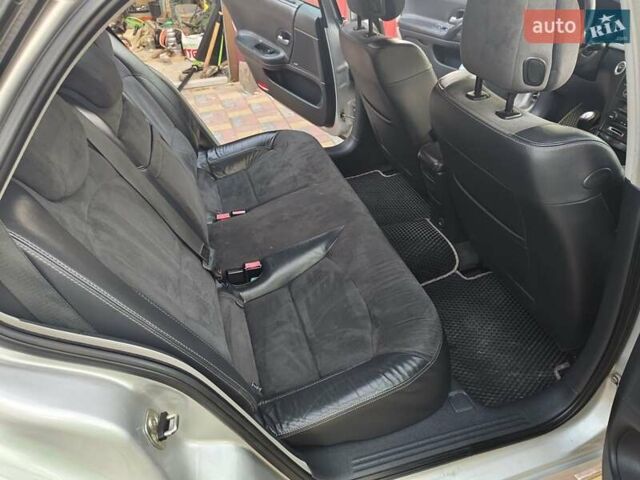 Серый Рено Лагуна, объемом двигателя 2 л и пробегом 150 тыс. км за 5200 $, фото 2 на Automoto.ua
