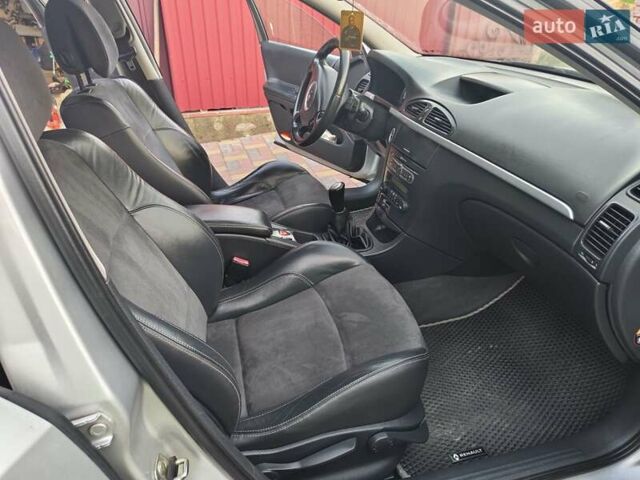 Серый Рено Лагуна, объемом двигателя 2 л и пробегом 150 тыс. км за 5200 $, фото 1 на Automoto.ua