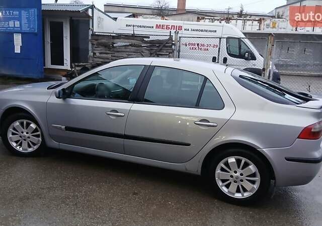 Сірий Рено Лагуна, об'ємом двигуна 1.6 л та пробігом 252 тис. км за 3900 $, фото 5 на Automoto.ua