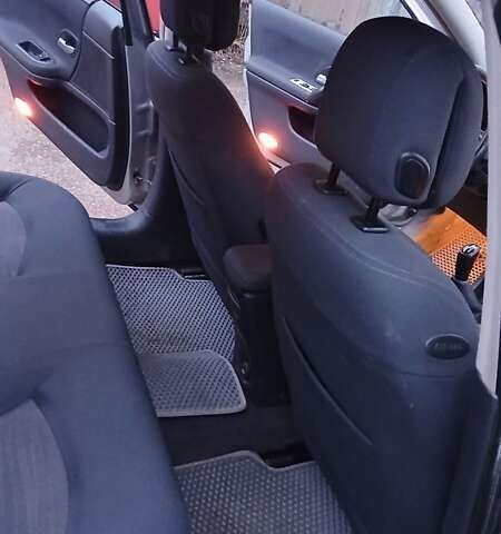 Сірий Рено Лагуна, об'ємом двигуна 1.6 л та пробігом 252 тис. км за 3900 $, фото 26 на Automoto.ua