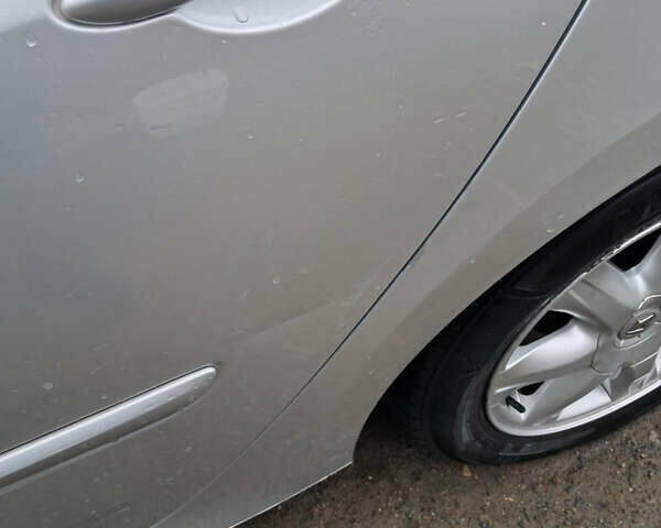 Рено Лагуна 2010 в Пустомытах на Automoto.ua Серый Рено Лагуна, объемом двигателя 1.46 л и пробегом 250 тыс. км за 5500 $, фото 5 на Automoto.ua