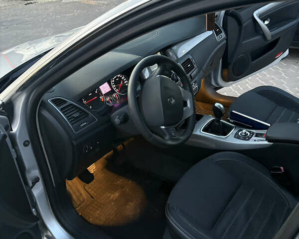 Серый Рено Лагуна, объемом двигателя 1.5 л и пробегом 205 тыс. км за 5999 $, фото 10 на Automoto.ua