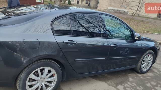 Серый Рено Лагуна, объемом двигателя 2 л и пробегом 220 тыс. км за 8299 $, фото 3 на Automoto.ua