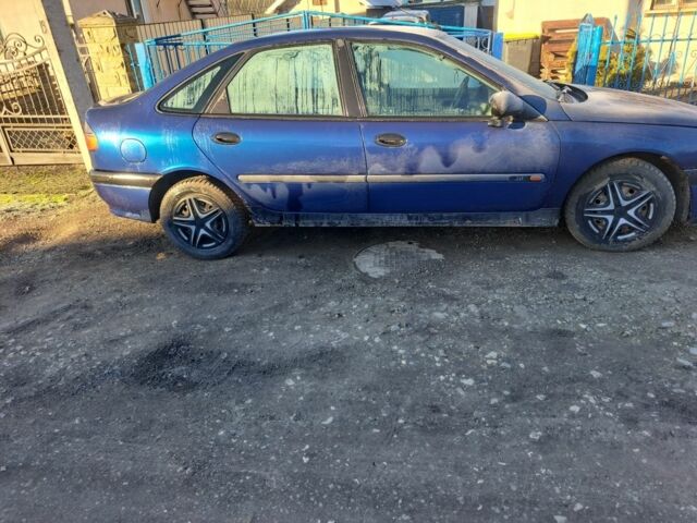 Синий Рено Лагуна, объемом двигателя 2 л и пробегом 333 тыс. км за 1300 $, фото 3 на Automoto.ua