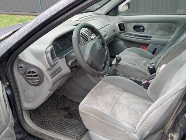 Синий Рено Лагуна, объемом двигателя 1 л и пробегом 4 тыс. км за 1500 $, фото 2 на Automoto.ua