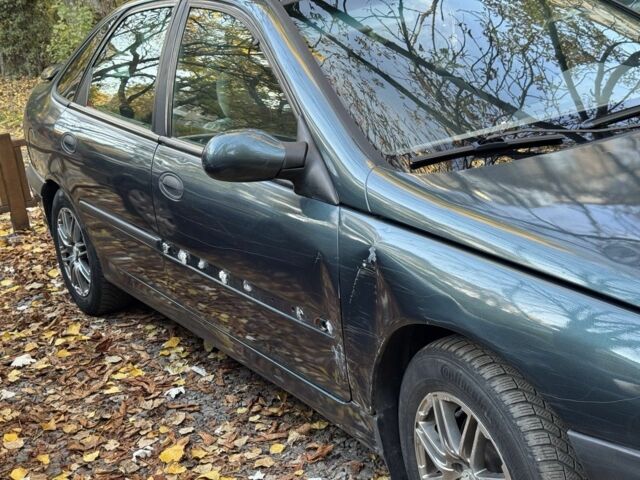 Синій Рено Лагуна, об'ємом двигуна 2 л та пробігом 370 тис. км за 2000 $, фото 5 на Automoto.ua