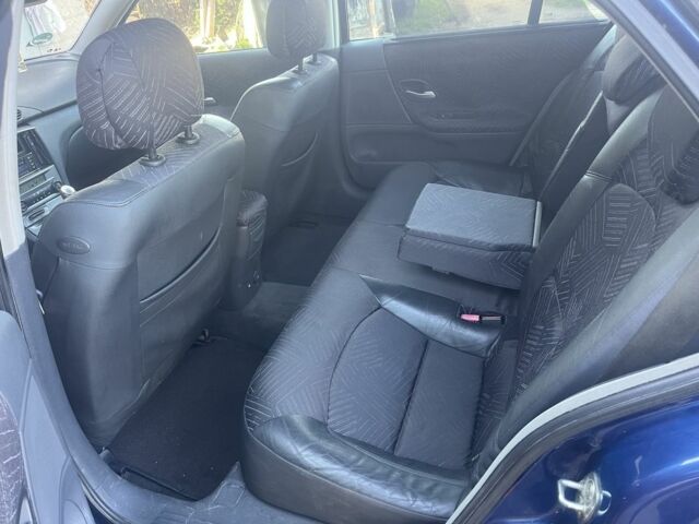 Синий Рено Лагуна, объемом двигателя 1.8 л и пробегом 172 тыс. км за 1799 $, фото 12 на Automoto.ua