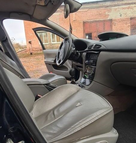 Синий Рено Лагуна, объемом двигателя 1.9 л и пробегом 280 тыс. км за 2800 $, фото 14 на Automoto.ua