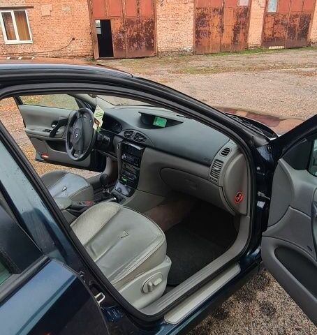 Синий Рено Лагуна, объемом двигателя 1.9 л и пробегом 282 тыс. км за 2550 $, фото 16 на Automoto.ua