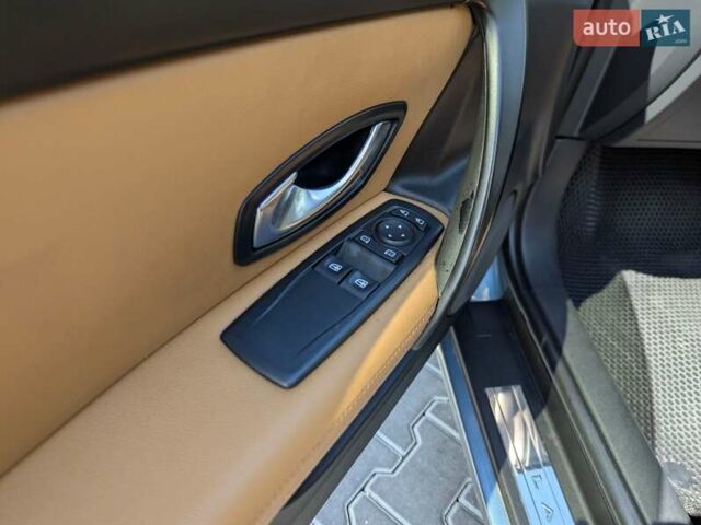 Синий Рено Лагуна, объемом двигателя 2 л и пробегом 162 тыс. км за 8799 $, фото 11 на Automoto.ua