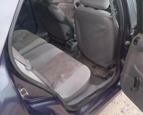 Синий Рено Лагуна, объемом двигателя 2 л и пробегом 240 тыс. км за 1750 $, фото 4 на Automoto.ua