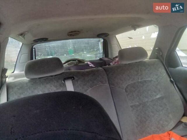 Синий Рено Лагуна, объемом двигателя 1.8 л и пробегом 400 тыс. км за 900 $, фото 3 на Automoto.ua