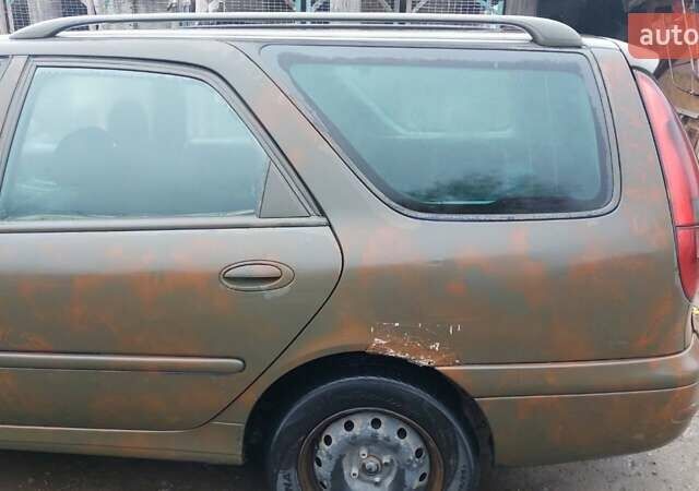 Синий Рено Лагуна, объемом двигателя 1.9 л и пробегом 360 тыс. км за 1000 $, фото 15 на Automoto.ua