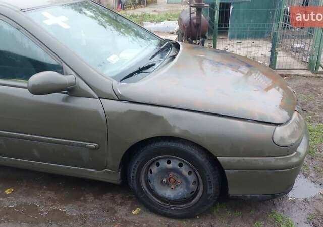 Синий Рено Лагуна, объемом двигателя 1.9 л и пробегом 360 тыс. км за 1000 $, фото 13 на Automoto.ua