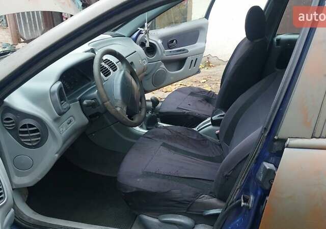 Синий Рено Лагуна, объемом двигателя 1.9 л и пробегом 360 тыс. км за 1000 $, фото 10 на Automoto.ua
