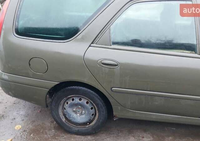 Синий Рено Лагуна, объемом двигателя 1.9 л и пробегом 360 тыс. км за 1000 $, фото 14 на Automoto.ua