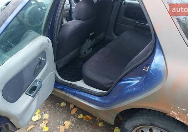 Синий Рено Лагуна, объемом двигателя 1.9 л и пробегом 360 тыс. км за 1000 $, фото 5 на Automoto.ua