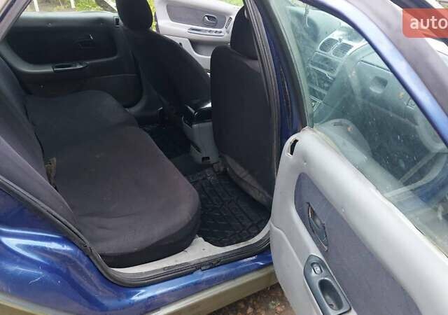 Синий Рено Лагуна, объемом двигателя 1.9 л и пробегом 360 тыс. км за 1000 $, фото 19 на Automoto.ua