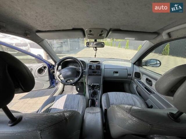 Синий Рено Лагуна, объемом двигателя 1.9 л и пробегом 420 тыс. км за 2600 $, фото 6 на Automoto.ua