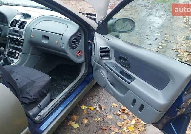 Синий Рено Лагуна, объемом двигателя 1.9 л и пробегом 360 тыс. км за 1000 $, фото 8 на Automoto.ua