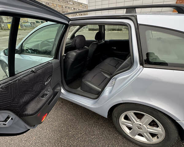 Синий Рено Лагуна, объемом двигателя 1.8 л и пробегом 390 тыс. км за 3500 $, фото 6 на Automoto.ua