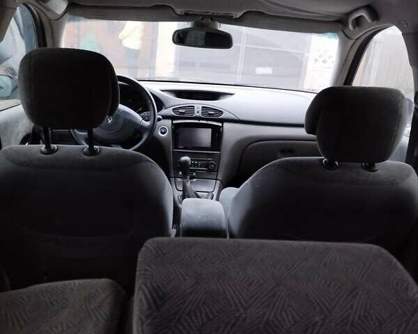 Синий Рено Лагуна, объемом двигателя 1.6 л и пробегом 309 тыс. км за 5500 $, фото 4 на Automoto.ua