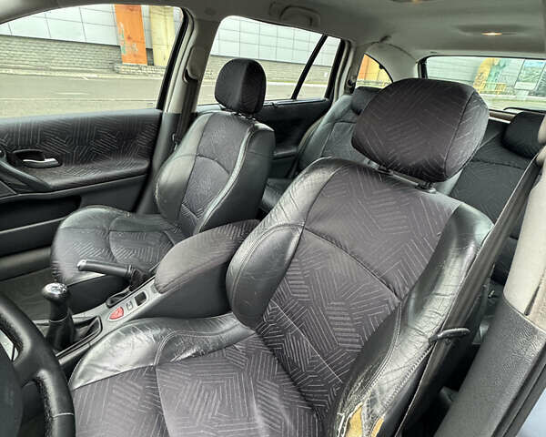 Синий Рено Лагуна, объемом двигателя 1.8 л и пробегом 390 тыс. км за 3500 $, фото 15 на Automoto.ua