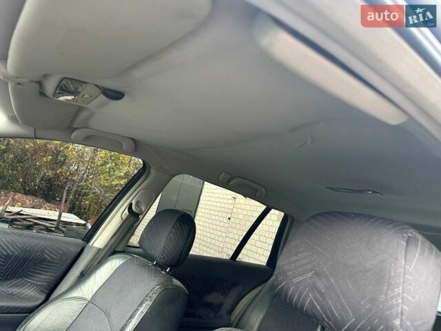 Синий Рено Лагуна, объемом двигателя 1.8 л и пробегом 358 тыс. км за 1377 $, фото 19 на Automoto.ua