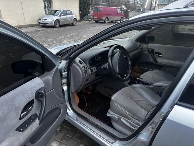 Синий Рено Лагуна, объемом двигателя 1.8 л и пробегом 260 тыс. км за 1300 $, фото 4 на Automoto.ua