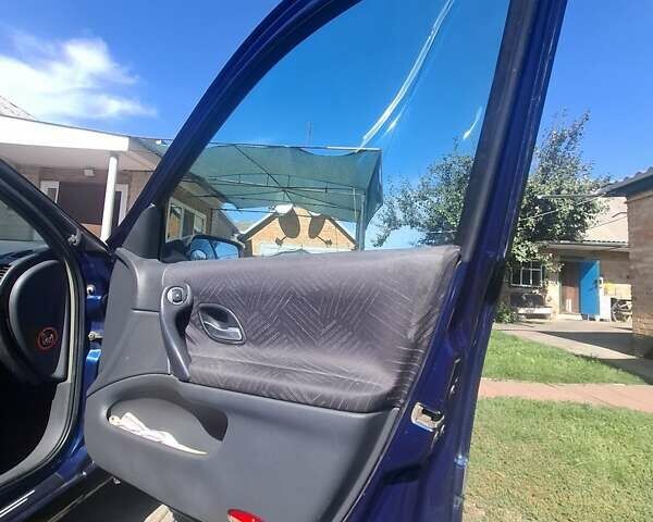 Синий Рено Лагуна, объемом двигателя 1.8 л и пробегом 312 тыс. км за 4300 $, фото 30 на Automoto.ua