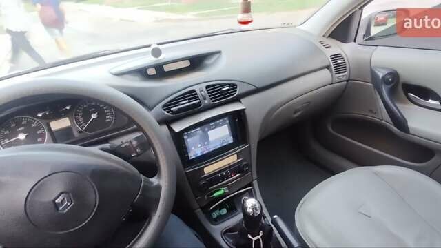 Синій Рено Лагуна, об'ємом двигуна 1.8 л та пробігом 279 тис. км за 5200 $, фото 7 на Automoto.ua